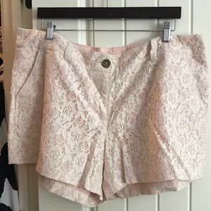 Pink and white lace shorts.